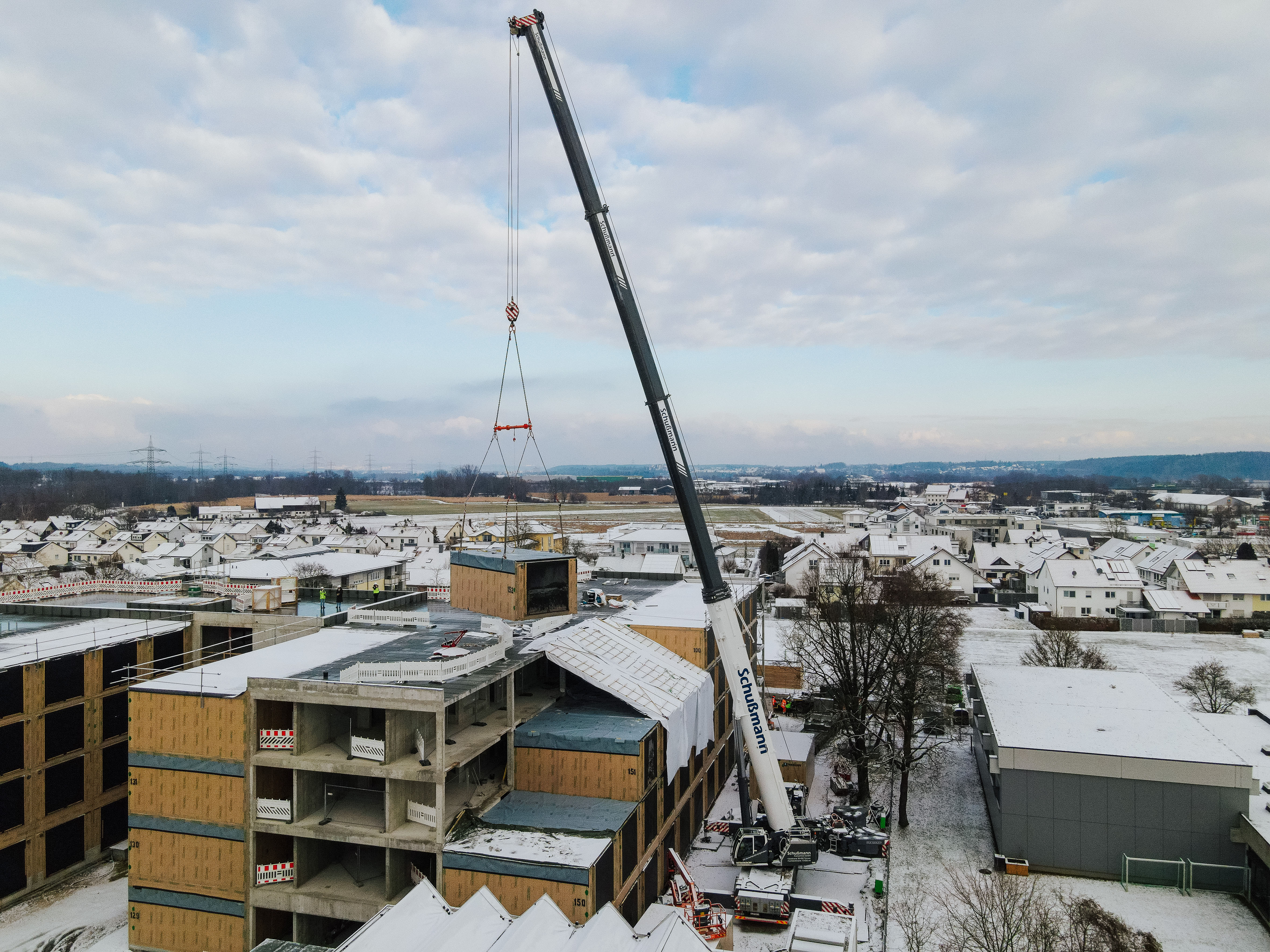 Liebherr Crane Combines Timber Modules With Reinforced Concrete for ...
